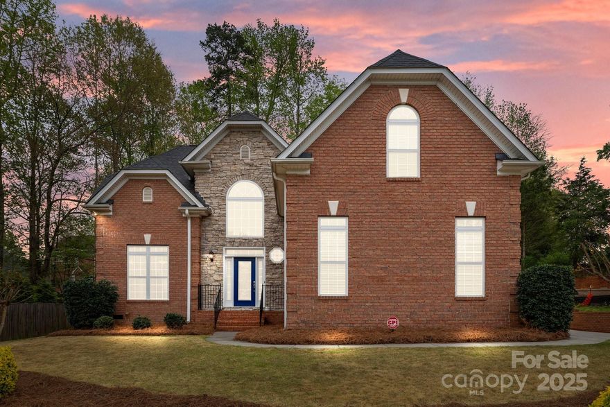 Welcome to this inviting full brick custom home by Persis-Nova, with 5 BR, 3.5 BA, loft & finished storage. Notable updates in 2025 include new paint, carpet, master bath shower glass, roof and refinished Brazilian cherry HW floors. The chandeliered foyer with double-tray crown molded ceiling opens to a wrought iron & cherry staircase and the 19’ high great room, which serves as the central gathering space of the home.Oversized and single-hung windows light the kitchen, dining room, sunroom, informal dining, living area and loft. The kitchen is fitted with maple cabinetry, Jenn-Air cooktop, 60/40 composite under-mounted sink, & granite countertops. The main floor includes a primary suite with single tray crown molding, walk-in closets, primary bath w/ glass shower & jacuzzi tub. A wrought iron and cherry walkway connects the 2nd level. One side offers a BR, full bath, loft, and finished storage, while the other side consists of 2 BR's, a large bonus RM, and another full bath.