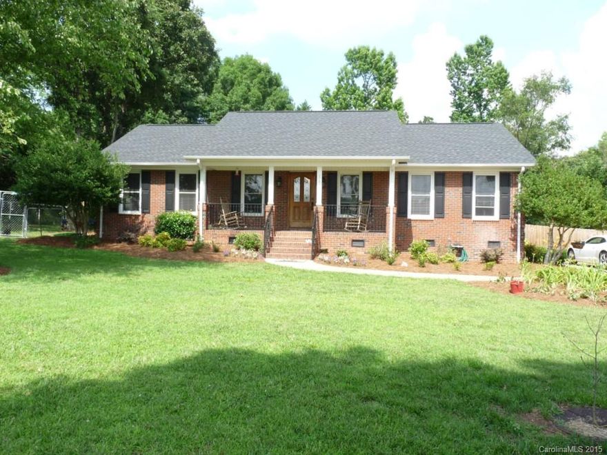 This home has it all, new tile & granite kitchen counter tops being installed, custom cabinets w extra features,  crown molding, new carpet, large walk in closets, heated tile in master bath, jacuzzi tub are just a few of the features on the inside, outside offers a new 2 tier deck, privacy fence, 3 buildings, 16x30, 30x40 and 60x60 with 3 phase wiring, once used as a cabinet shop, new roof, all on 2.88 acres in Buford school district. Don't wait to come out and see this all brick home.