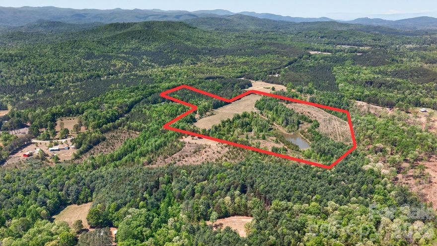 Rare opportunity to own 37.4 acres with no city taxes, no HOA, and no restrictions—offering the freedom and flexibility to create the homestead, private estate, mini-farm, or recreational retreat you’ve been dreaming of. This property features approximately 7.25 cleared acres of pasture, 9 acres in planted loblolly pine, and 33.4 acres is fenced with a six-strand electric fence, making it well-suited for livestock, horses, or agricultural use. With 373 feet of road frontage, the property offers excellent accessibility while still providing plenty of privacy and space to spread out. One of the standout features is the beautiful 1 surface-acre dual spring-fed pond already stocked with fish! This pond was thoughtfully designed and constructed under the supervision of a professional engineer with the NC Division of Soil and Water. Whether you envision peaceful country living, a private estate setting, or a functional homestead, this land offers a rare combination of usable pasture, water features, fencing, and unrestricted potential. Showing request must be made and sellers to accompany all parties walking or viewing the land.