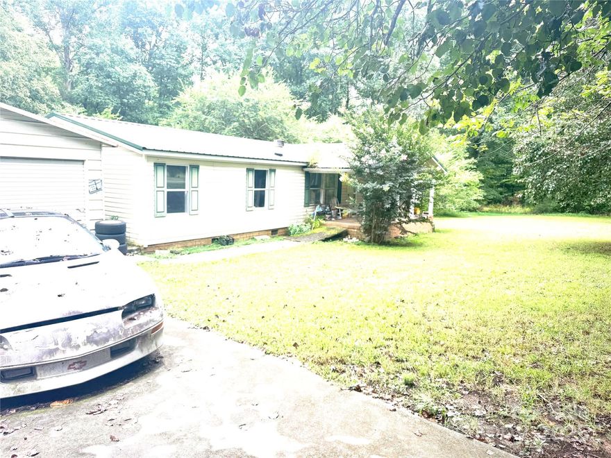 Attention buyers and investors! This is a unique opportunity to own over 5 acres of riverfront land. The property includes a clubhouse with endless potential, providing the perfect foundation to create a new dream on your own.