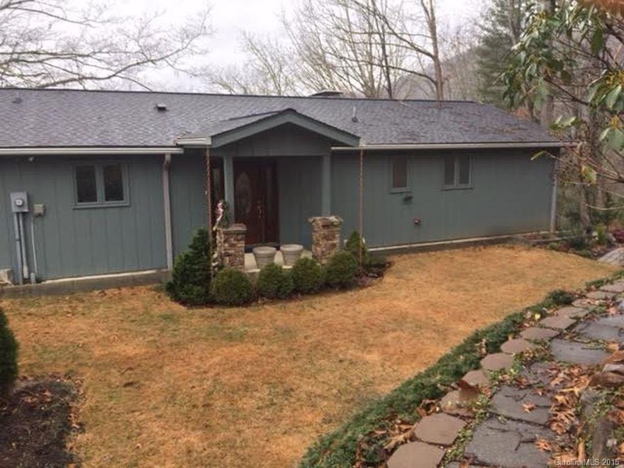 Remarkable home in a quiet, private setting just off Buchanan Loop. Remodeled and redesigned for comfortable
living.  You will love this house. Large master on main, office space, formal dining room, sun room, garden paths and serene vistas. Detached garage with upstairs space for workshop and more.