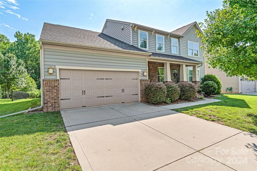 This spacious 5 BR/3BA home in Rosemont has so much to offer! Experience the tax and school advantage while being close to all that south CLT has to offer! On the main, there is a guest BR/full BA, plus an office. Large and bright formal dining room perfect for holiday gatherings.  Open concept LR, brkfst, and kitchen which features granite countertops, gas stove, ss appliances, and a pantry.  Neutral paint throughout and plantation shutters.  Upstairs you'll find a large owner's suite with wood flooring, crown moldings, ensuite BA, and a huge closet.  Large secondary BR's and a flex space.  Tons of storage. Step outside to a gorgeous all season vaulted porch with a beautiful stone fireplace.  Extended deck and fenced yard.  Property extends far beyond the fence, with a mature treeline and a creek just beyond.
Community amenities include a pool, tennis courts, and clubhouse.  Meticulously cared for and energy-efficient home.  3.84kW solar panels installed in September '20.