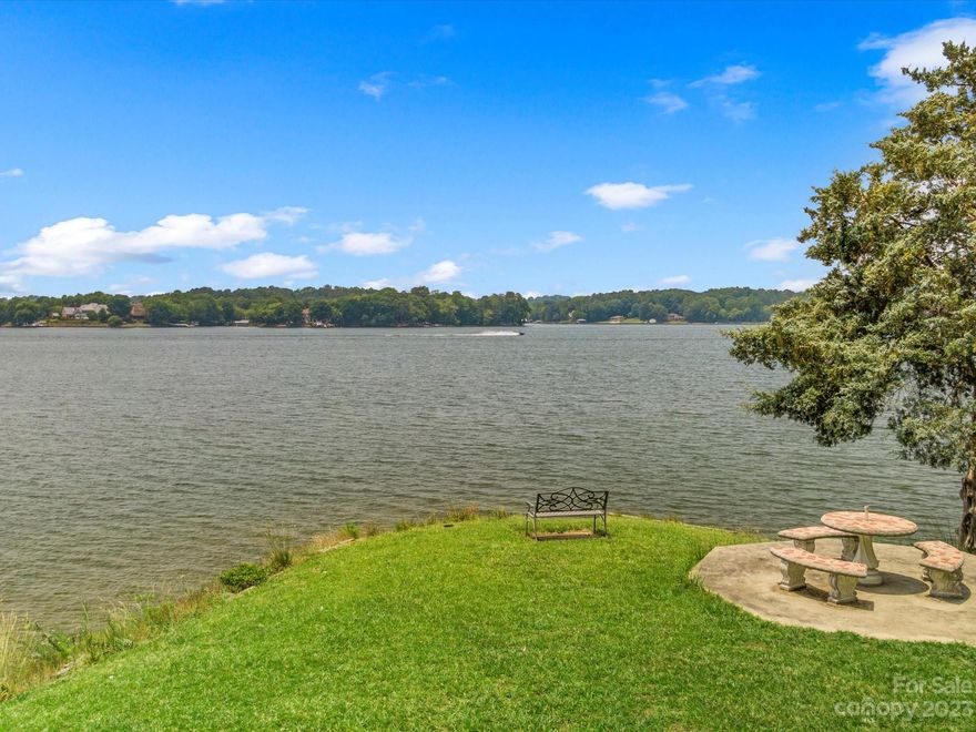 If You Are Looking for An Incredible, Almost Unheard of 2.19 Acre Waterfront Lot on Lake Wylie’s "Main Channel" with Amazing Panoramic Waterfront Views & Breathtaking Sunsets, You Have Found It!  Absolutely Perfect for Lakefront Living, Boating, Fishing, & Swimming.  Enjoy as a Summer Retreat, or Remove & Build Your Own Fantastic Lake Front Paradise.  The Property Is Conveniently Located to Uptown Charlotte, Shopping, Dining, & approximately 21 min., from Charlotte Douglas Int'l Airport.  This Property Offers a Gated Entrance, a Permitted Floating Dock, Lakeside Patio, and a Large Wrap Around Lakeside Porch With Serene Big Water Views. The Kitchen's Appliances Are Included.  The Home Has a Partial Basement, w/Kitchen, Bath & Private Entrance.   No City Taxes or HOA. The Home is Being Sold As-Is & No Repairs Will Be Made.