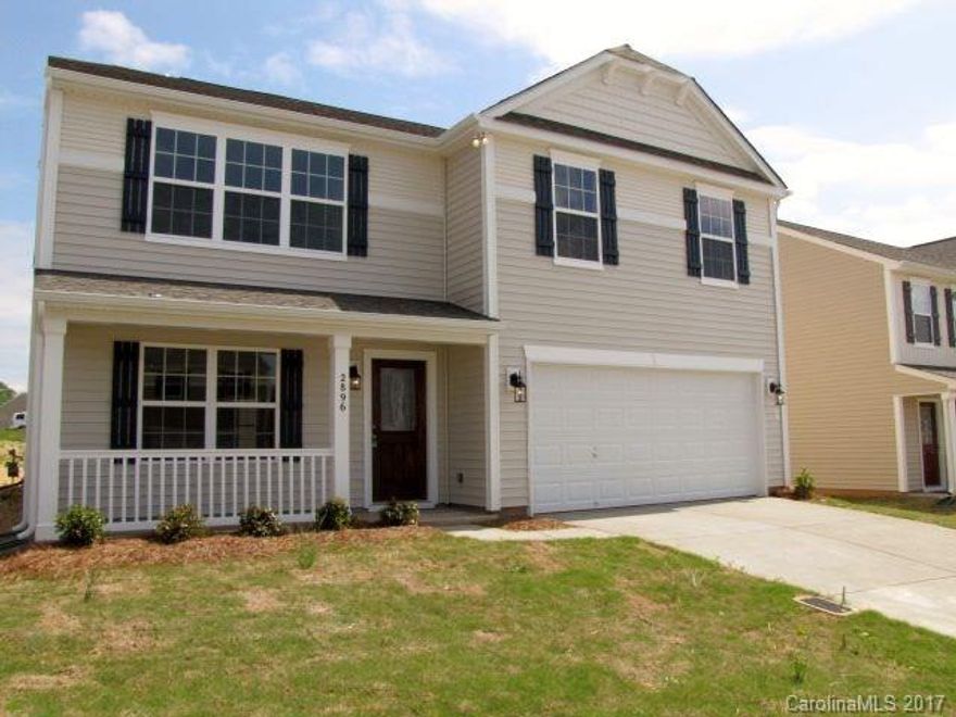 4-bedroom home on a corner lot offers neutral colors and nearly 2500 square feet of space, including formal dining, 1st-floor study, family room w/corner fireplace. Kitchen w/cherry cabinets is open to a bright breakfast nook. The over-sized master features vaulted ceilings, a huge walk-in closet, and a bath w/dual sinks, a tub and a shower. Community amenities include a pool & playground.