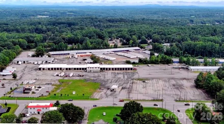 Rare opportunity to acquire a large-scale industrial asset situated on 72.61± acres in Cherryville, North Carolina. Designed to accommodate high-capacity operations, the site offers ample room for equipment staging, fleet parking, outdoor storage, and future expansion. This expansive property includes seven industrial buildings, break bulk, multiple service bays, and extensive outdoor storage and parking, offering immediate operational capacity with long-term redevelopment making it ideal for manufacturing, heavy equipment operations, logistics, or Industrial services. The site’s scale, existing infrastructure, and zoning support a wide range of industrial uses, positioning the asset well for owner-users, investors, or value-add strategies. 
Key Features: 72.61± acres of industria ,7 on-site industrial buildings with flexible layouts,Break Bulk suitable for storage, repair, maintenance, or specialty operations,Multiple bays for service, loading, and equipment access
Extensive outdoor storage and parking capacity, Infrastructure suitable for heavy industrial use with room for expansion.
Private, controlled-access setting with industrial-scale footprint
Potential Uses:
Equipment maintenance and repair facility, Logistics, distribution, storage or fleet operations.
Location Highlights: Located in Cherryville, NC, within reach of regional transportation corridors. Strong access to labor markets in surrounding counties. Ideal balance of privacy, acreage, and operational flexibility.
Investment Highlights: Rare opportunity and versatile site adaptable to a wide range of industrial users, Attractive for owner-users, investors, or redevelopment strategies. Schedule your tour today.