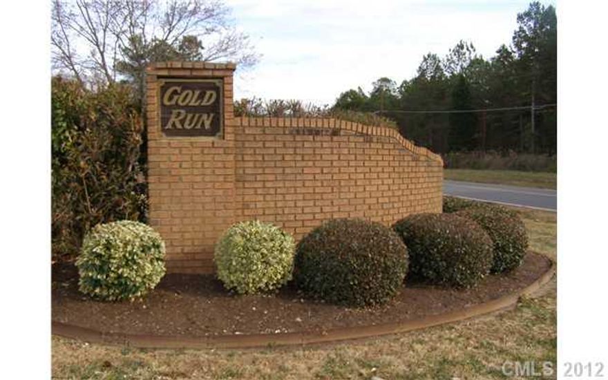 Lg res. lot in estab. Gold Run Sub. Public Water & gas avail. Septic req.