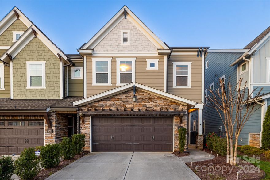 LOCATION LOCATION LOCATION! Nestled in the heart of Sedgefield and a short walk to SouthEnd's breweries, restaurants, bars, shopping and the light rail! This well maintained 4 bed/3.5 bath & 2-car garage duet townhome w/primary suite on main has it all. Step inside to the light-filled, open-concept living featuring a chef-style kitchen w/large island, gas cooktop, granite & SS appliances. Hardwoods throughout main floor & upstairs loft. Designer lighting fixtures & plantation shutters. Vaulted ceiling in primary and custom closet shelving in walk-in closet. Upstairs you'll find a large loft, 3 spacious bedrooms (the one with wallpaper accent wall was used as an office) and 2 full baths (one in hallway & one private en-suite). Enjoy cocktails in the screened porch and grilling on the extended paver patio & fully fenced backyard. There's even a patch of artificial turf for your furry friend!