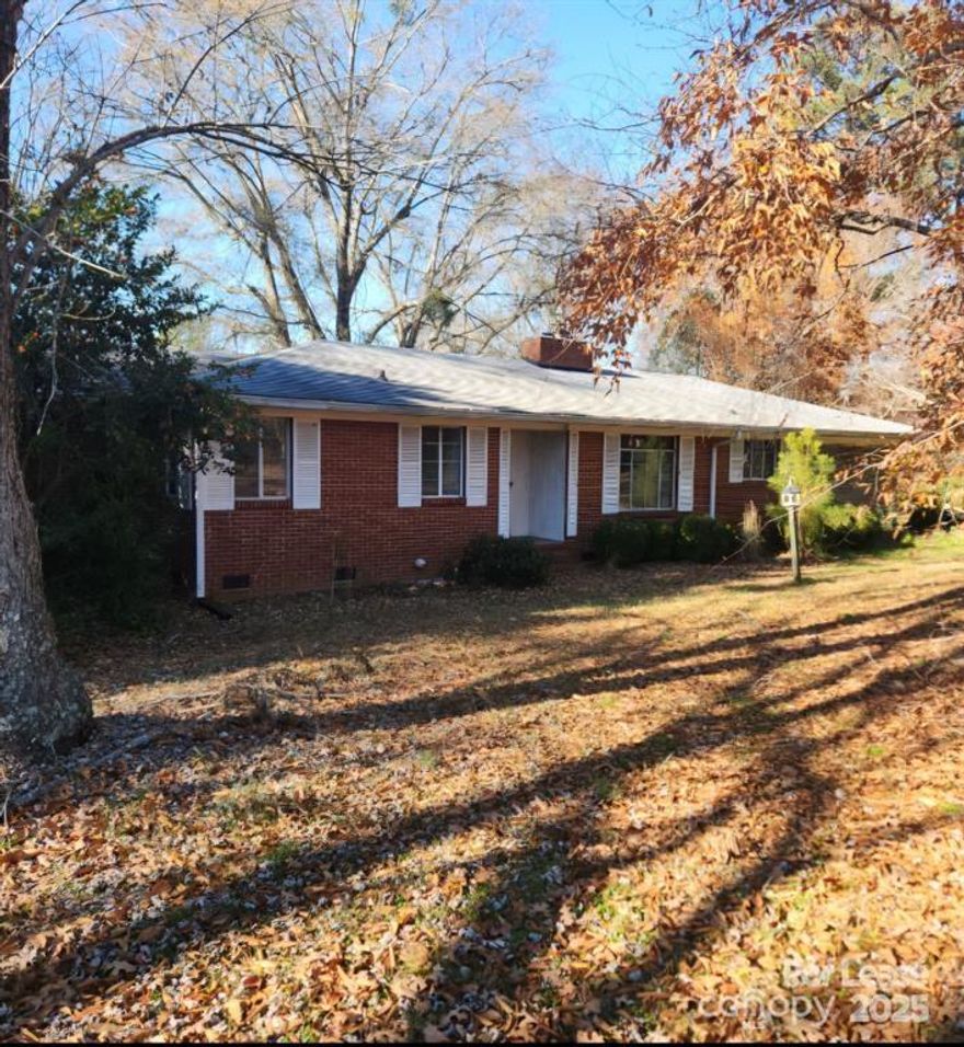 3 BR 2 full bath brick ranch for rent with single car garage.  Corner lot.  Screened/glass sunroom off the kitchen.  Den w/fireplace.  Large DR with big bay window. Home needs a little updating but come make this your home!  Basement is accessed from outside with garage door. Tenant is responsible for ALL utilities.  6 month to 1 yr lease required.