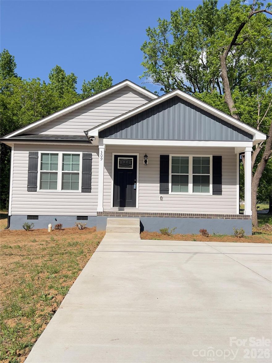 Brand-new construction in the growing Salisbury/East Spencer area—perfect for first-time homebuyers seeking comfort, efficiency, and low-maintenance living. This thoughtfully designed home features an open-concept layout that seamlessly connects the kitchen, dining, and living areas, along with a split bedroom floor plan for added privacy. Enjoy modern finishes and energy-efficient systems throughout. The kitchen comes equipped with an electric range, refrigerator, microwave, garbage disposal, and window blinds for added convenience. Ideally located near downtown Salisbury with easy access to shopping, dining, and major highways, making daily living and commuting simple. A great opportunity to own a new home at an attainable price point.