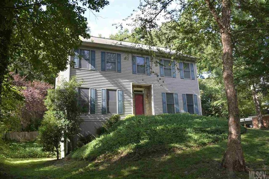 "Understated elegance" defines this classic neo-colonial home in NW Hickory. The curb appeal illustrates only the beginning of the attention to detail. Updated  home features timeless architecture with all the modern touches. The warm and tasteful color palate invites you to sit and visit. The exquisite kitchen with custom cabinets and granite counter tops will bring out the chef in you. The stacked-stone fireplace in the great room beckons you to relax. The tile baths have a spa-like feel. The spacious bedrooms promise a good night's rest and the master suite is your own private retreat. The unique loft would make an excellent office or game area and the full, unfinished basement is but a blank canvas awaiting your future needs. The deck overlooking the beautiful grounds is ready for entertaining. The double garage will keep you and your cars out of the weather. Words and pictures cannot do justice...come and see for yourself and fall in love with your next home.