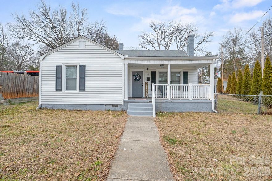 Back on the market with a new price. NEW ROOF to be installed for the potential buyer before the closing. FHA approved lease program option available. Discover this beautifully remodeled 2-bedroom, 1-bath bungalow nestled in the heart of historic Downtown Concord. Built in 1936 and offering approximately 1,042 sq ft of charming single-level living on a compact 0.11-acre lot, this home combines timeless appeal with modern updates for effortless, low-maintenance living. Step inside to an inviting open layout featuring fresh luxury vinyl plank flooring throughout the main areas and cozy new carpet in the bedrooms. The standout, recently remodeled kitchen boasts brand-new cabinets, sleek granite countertops, and premium stainless-steel appliances—perfect for everyday meals or entertaining. Both bedrooms provide comfortable, flexible space. Additional highlights include a welcoming covered front porch ideal for relaxing, and no HOA fees. The low-maintenance exterior and small, easy-care yard make this an excellent choice for first-time buyers, downsizers, or investors. Prime location just steps from vibrant Main Street—walk to restaurants, boutiques, the farmers market, community events, and the historic district. Enjoy quick access to Concord Mills, Charlotte Motor Speedway, parks, and major commuter routes to Uptown Charlotte (20-30 minutes). Cabarrus County Schools serve the area, with strong options nearby. Priced competitively in a growing market, this turnkey gem offers historic charm, modern convenience, and unbeatable downtown walkability.