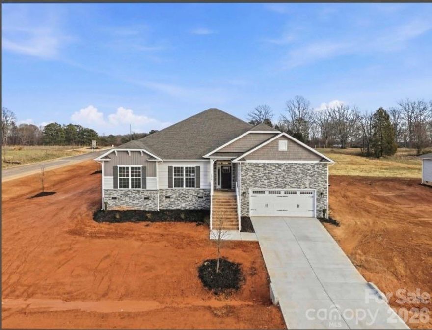 COMPLETE AND READY TO MOVE IN!  The 2505 ranch floor plan is spacious and very versatile situated on almost one acre.  With soaring ceilings and a fireplace, the great room is perfect for enjoying time with others. The kitchen features a center island with breakfast bar stainless appliances. Retreat to the primary suite offering an ensuite featuring dual vanities, tiled shower with bench seat and a generously sized walk-in closet. You will find additional space with the bedrooms and possible office area. These rooms provide ample space and for family members or guests, ensuring everyone feels at home. Don't miss the opportunity to own a home that surpasses your expectations. The 2505 floorplan invites you to elevate your living experience by enjoying all the comforts this home has to offer. Covered 16x14 back porch, coffered ceilings, gridded window panes, drop zone, and beautiful stone package. Flex cash and special interest rates available. Standard closing costs are paid by the seller. Photos are representative and may reflect a staged home.