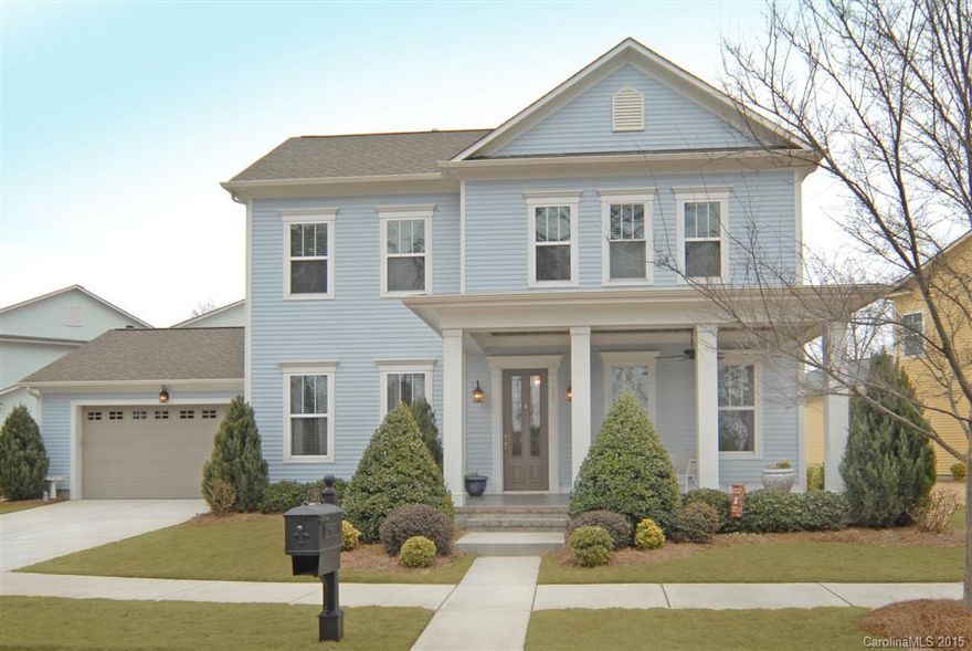 One of a kind, 4BR home on quiet street in beautiful golf community of Springfield. Backs up to large Green Space. Spectacular 4 pc crown moulding. Master on main. Large open kitchen w/ double ovens (1 convection), breakfast nook, granite, tile backsplash, stainless appliances. Granite in half bath. Marble in others. Tons of storage w/ walk-in attic & 2 pull-down accesses, screened-in porch. All BRs have WIC. Outstanding community amenities. HOA performs yard maintenance. Fort Mill Schools.