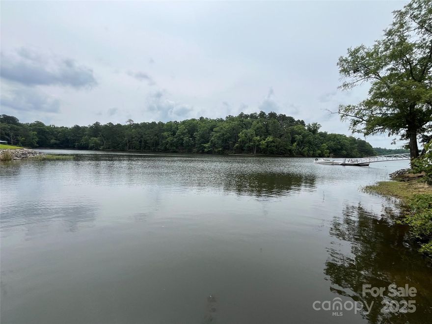 Lake it & Land here!  1.38 Acre waterfront lot with pier/floating dock in place. Septic approved.  Bring your builder and enjoy lake life!