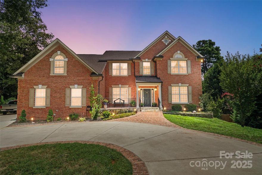 “This all-brick home, set at the end of a private cul-de-sac in Crown Harbor, offers 5–6 bedrooms and 5½ baths surrounded by mature trees. A classic two-story layout with a finished basement provides flexible living, including a main-level mother-in-law suite.

The updated kitchen features granite countertops and a breakfast bar. Hardwood floors throughout the entire home, fresh paint and stylish updates create a move-in-ready feel. The basement adds even more living space with a full luxurious bath, private office with built in cabinets, and plenty of spaces for fun.

Crown Harbor amenities include lake access, pool, boat slips , and boat storage, plus nearby courts and parks. Walk to Fresh Market, shops, and dining—this home combines comfort, convenience, and location in one of the area’s most sought-after neighborhoods.