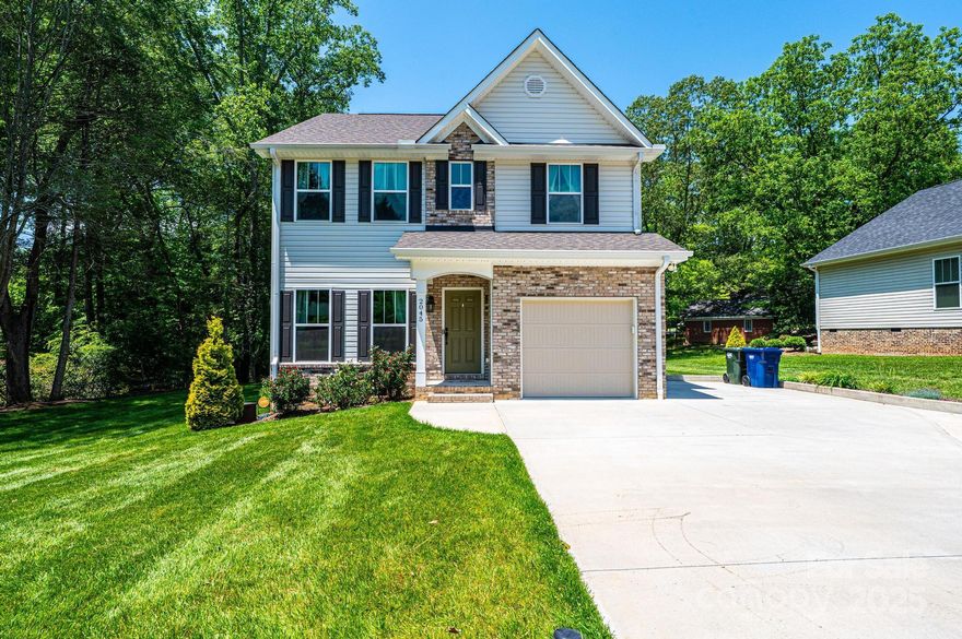 Cute as a button and ready for a new owner, this 2-story home is centrally located in Hickory close to Lenoir-Rhyne, shopping, dining, City Walk, and more!  Main level features open living space and kitchen with granite countertops, island, stainless steel appliances, vinyl plank floors as well as a bedroom and full bath.  Sliding glass doors off dining area lead to back patio overlooking the back yard. Spacious primary bedroom is upstairs with a walk-in shower and closet. Two additional guest rooms, full third bath, and laundry room complete the upstairs. Upgrades completed by sellers include professionally installed leaf guards, extensive landscaping, concrete patio, sprinkler system, shower doors in all bathrooms, and epoxy floor in the garage.