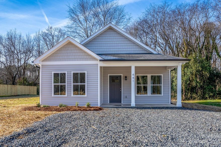 This is a beautiful home with 9' tall ceilings throughout, wonderful light colors, lots of windows and a great big open feel! 3 bedrooms and 2 bathrooms. Primary bedroom has it's own private bathroom. Nice sized covered porches with wood ceilings which are absolutely gorgeous. Open kitchen with center island and granite countertops throughout the entire home. Cabinetry is all white with stainless steel knobs and appliances.