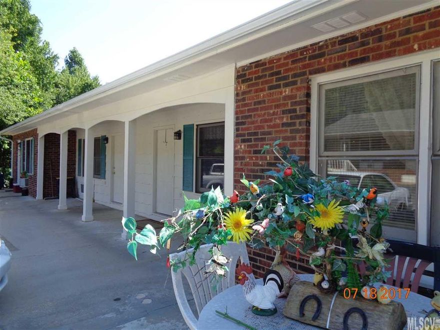 8 1 bedroom 1 level apartments with city water and sewer. 2 buildings one has basement that might could be finished into 4 more units. Some land already cleared ready for more units. Rental history with long term tenants. Listing agent related to seller. All units have electric ceiling heat and window a/c.