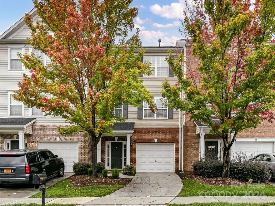 Incredible value in Cabarrus County! Lowest priced 4 bedroom, 3.5 bath townhome w/new carpet & paint is ready for you! Convenient bedroom & full bath on lower level leads out to covered patio w/ tons of privacy. Main level boasts an eat in kitchen with an abundance of cabinets, granite countertops,&  black appliances including new dishwasher and garbage disposal.  Separate dining room with upgraded overhead lighting opens to the great room with gas fireplace. Upper level has primary bedroom with ensuite; vanity with dual sinks, oversized tub/shower combo & walk in closet with extra shelving. 2 secondary bedrooms share hall bath. Relax on the back deck & enjoy the beautiful wooded view. Walk to neighborhood schools & amazing community amenities including 4 pools, tennis/pickleball, playground, sportscourt, clubhouse with fitness center, walking trails & so much more. Refrigerator, washer & dryer are included. Garage is painted & floor is epoxy coated. Per seller, roof replaced 2022.