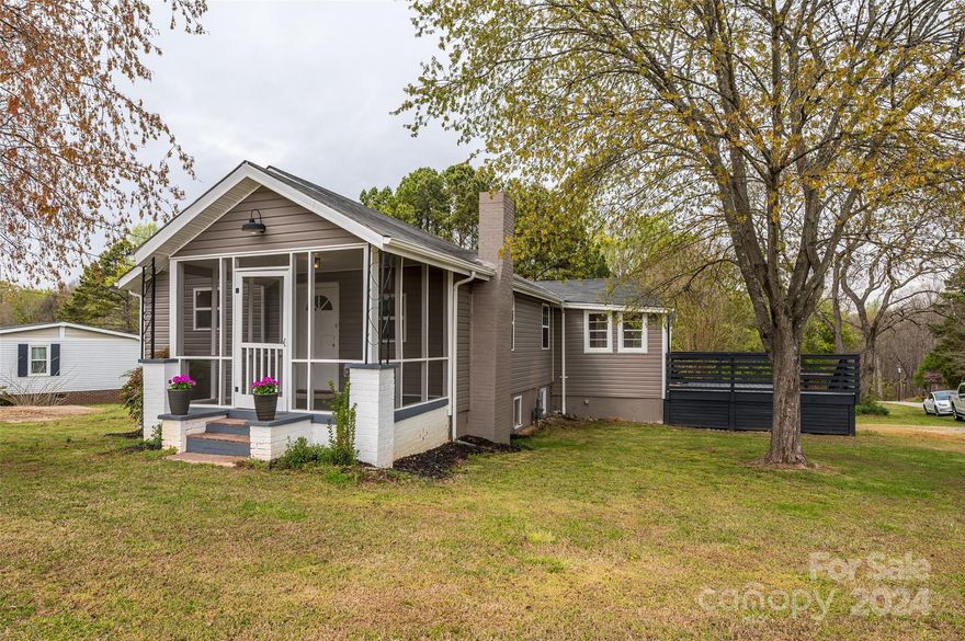 This is a must see! This updated 1940s home in this great location in Mooresville NC on .61 acres has everything you are looking for! Great Updated kitchen with stainless steel appliances, updated bathrooms in beautiful neutral colors, new flooring, new siding,  2 bedrooms and a great drop zone area. Great rocking chair screened porch in the front of the house and back deck for grilling. Carport and large yard for a garden or outdoor activities. Outdoor shed for more storage.  Walk in basement from exterior which can be used for a shop or for canning and storage. This beautiful home is also in a great school district. Home has already had an FHA Appraisal done of 318k – Easy access to I-77 or downtown Mooresville or Davidson. Don’t miss this one!