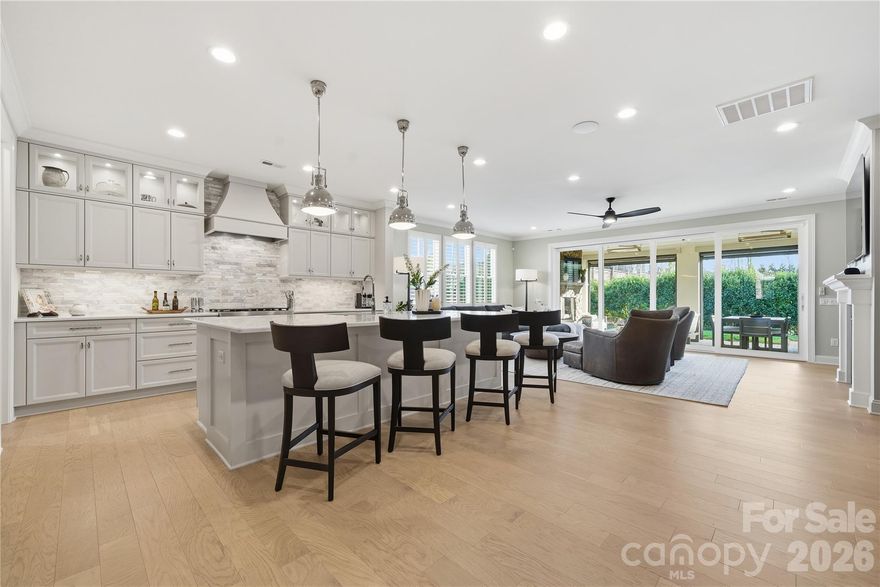 There is a certain kind of home that feels immediately, unmistakably right. This is that home.

Effortless luxury. Thoughtful design. A lifestyle worth coming home to. Welcome to 1016 Thatcher Way.

The heart of this 2022 Classica Home is a 16-foot accordion glass wall that opens to a resort-caliber outdoor living room - stone fireplace, retractable screens, ceiling heaters, lounge and dining for a crowd. Year-round. Rain or shine. No other home currently for sale in Arden Mill offers anything close to this.

Inside, 3,746 square feet of wide-plank white oak hardwoods, designer lighting, and plantation shutters create an environment of effortless luxury. The kitchen centers on a striking 10-foot quartz island with upgraded cabinetry, gas range, and walk-in pantry - built for hosting the people you love with the sophistication they deserve. The main-floor primary suite offers a spa-level shower with dual shower heads, custom vanity, and integrated laundry, because convenience at this level is not optional. A first-floor guest suite means your guests feel as cared for as you do.

Upstairs: a bonus loft, media space, dedicated office, flex room, and two en-suite bedrooms - every space purposeful, every detail considered.

The yard is intentionally scaled for the buyer who values time over turf, easy to maintain, easy to leave, and perfectly complemented by the Pavillon Pocket Park just steps away whenever you want more green space.

Situated in Fort Mill's nearly sold-out Arden Mill community — minutes from Kingsley, steps from the park, and a short commute to Charlotte with South Carolina's tax advantage. Fort Mill School District: ranked #1 in South Carolina. This is the home your next chapter has been waiting for.

Full interactive 3D tour available. See media links.