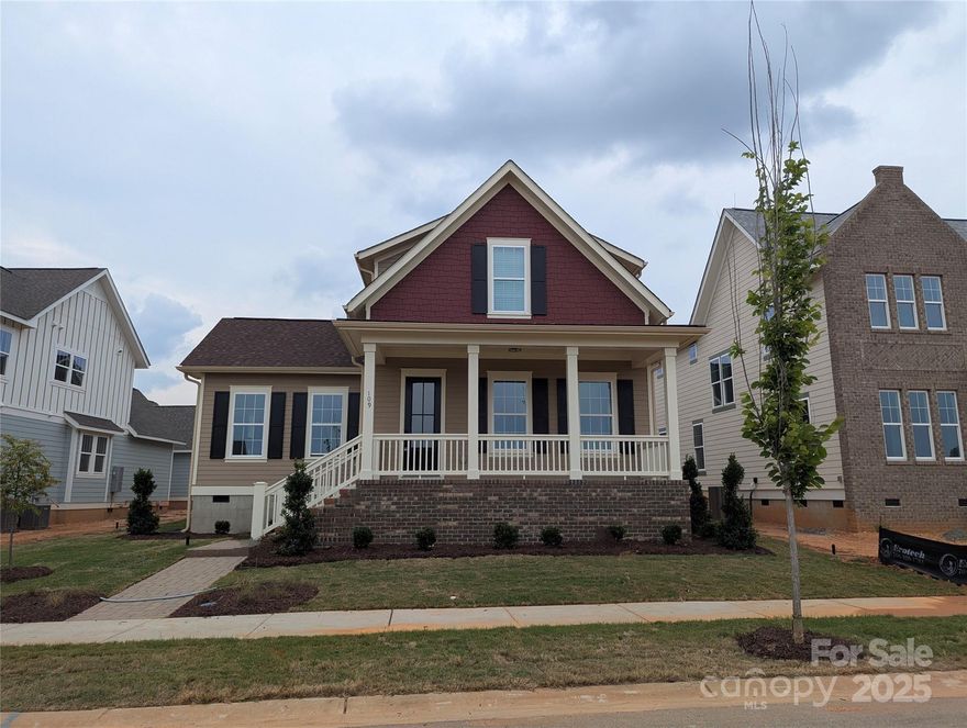 The Byford Plan features a wonderful first-floor living experience with an upgraded first floor guest suite. With vaulted ceilings in the kitchen and the living room, the natural light that flows into the home makes this plan feel bright and airy while retaining the cottage-style charm that makes this plan so special. The home boasts a spacious garage with extra parking in the driveway that is masked from street view using a decorative wall on the exterior of the home. This plan provides the perfect space to both relax and entertain!