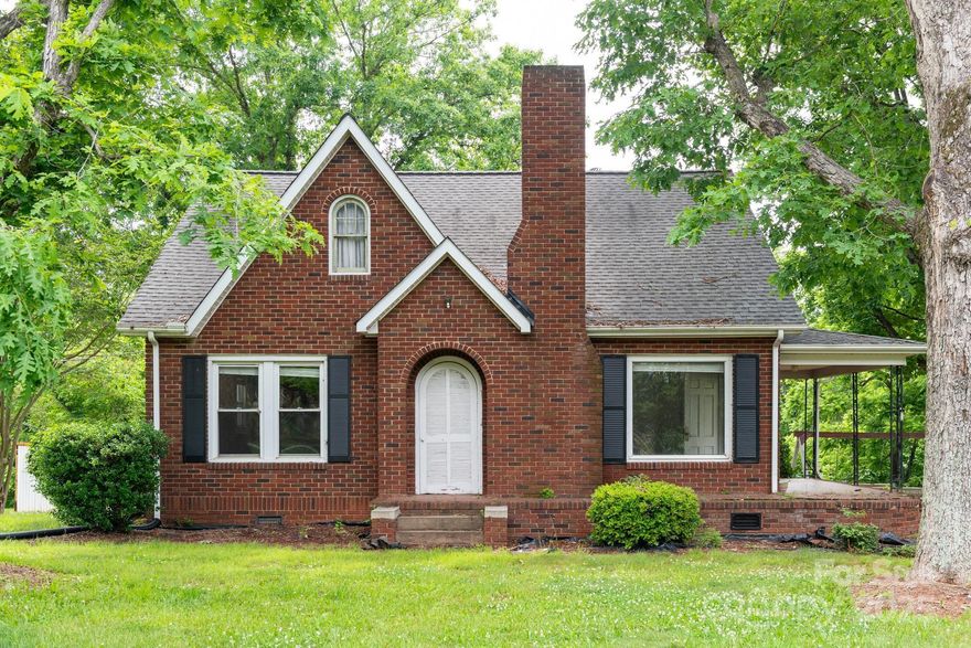 Charming full-brick 3-bedroom home nestled on 1.05 acres in the highly sought-after Mountain View area of Hickory! Enjoy cozy evenings by the fireplace in the inviting living room, or take in the peaceful surroundings from the spacious front and back yards, ideal for relaxing or outdoor fun. The main level features comfortable living spaces, while a classic wooden staircase leads to two additional bedrooms upstairs. Conveniently located just minutes from the local elementary school, this property offers both tranquility and accessibility. New roof installed 09/15/2025. Don’t miss your chance to own a piece of this desirable neighborhood!