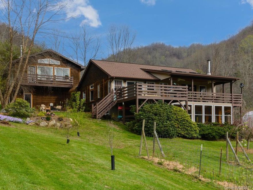 Rare opportunity to own a working farm with four additional rental houses situated in a picture book setting outside of Asheville. This farm has it all... stocked pond, views, rolling pastures, water wheel, stream, and majestic barns. Sit back and relax or get your hands dirty and start farming. Revenue currently generated via farming, vacation rentals, events, dinners and tours. Less acreage and structures available. Visit wncfarmforsale.com to see more, not everything on site included in sale.