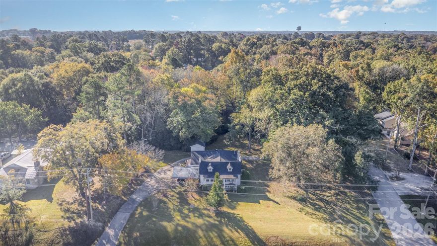 Appraised at $220,000 – Offered at $169,999!
Great renovation opportunity on this unique corner-lot property situated on approximately 1.30 acres along E. Arch Street in growing Lancaster, SC. Priced below recent appraisal, this property presents immediate value and strong upside potential.
Home is being sold as-is and will require TLC, including foundation and crawl space repairs. Please refer to property disclosure documents for additional details.
The home features a formal dining room, living room, and family room, offering generous space to reimagine and update. The inviting front porch provides the perfect place to relax, while the circular driveway and mature pecan trees add charm and curb appeal. The lot extends beyond the tree line, offering ample space for expansion, gatherings, or future possibilities.
A 248 sq. ft. wired storage building conveys and would make a great workshop, hobby space, or additional storage.
Currently zoned residential. Due to location, size, and surrounding development, there may be future potential (subject to city zoning approval).
Whether you're an investor looking to renovate, hold, or redevelop  this property offers flexibility and opportunity in an area experiencing continued growth.
Opportunities like this are rare — schedule your showing today.