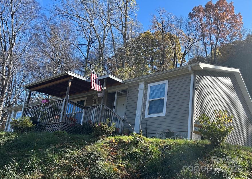 Spacious Home with Year-Round Access Near Waynesville, Maggie Valley & the Great Smoky Mountains

Welcome to your new mountain retreat! This beautifully maintained home offers year-round access and a central location close to all the area’s most popular attractions and amenities. Enjoy easy drives to Cherokee, Maggie Valley, Waynesville, and the Great Smoky Mountains National Park—perfect for those who love scenic views, outdoor adventures, and small-town charm.

Step inside to discover an open-concept floor plan designed for comfort and functionality. The bright and airy living area flows seamlessly into the kitchen and dining spaces, making it ideal for entertaining family and friends. The kitchen offers ample cabinet space and modern appliances, ready for your favorite home-cooked meals.

The primary bedroom suite is a true retreat, featuring double sinks, a separate shower, and a luxurious soaking tub—perfect for unwinding after a day of exploring the Smokies. Additional bedrooms provide plenty of space for guests, a home office, or hobbies.

This well-kept home has been lovingly cared for and is in excellent condition—ready for you to move right in. Outside, you’ll find a peaceful setting with room to enjoy the fresh mountain air year-round.

Whether you’re looking for a full-time residence, vacation home, or investment property, this home checks all the boxes. Well-priced and ready to go, it’s a wonderful opportunity to own a piece of mountain living close to everything Waynesville has to offer.
