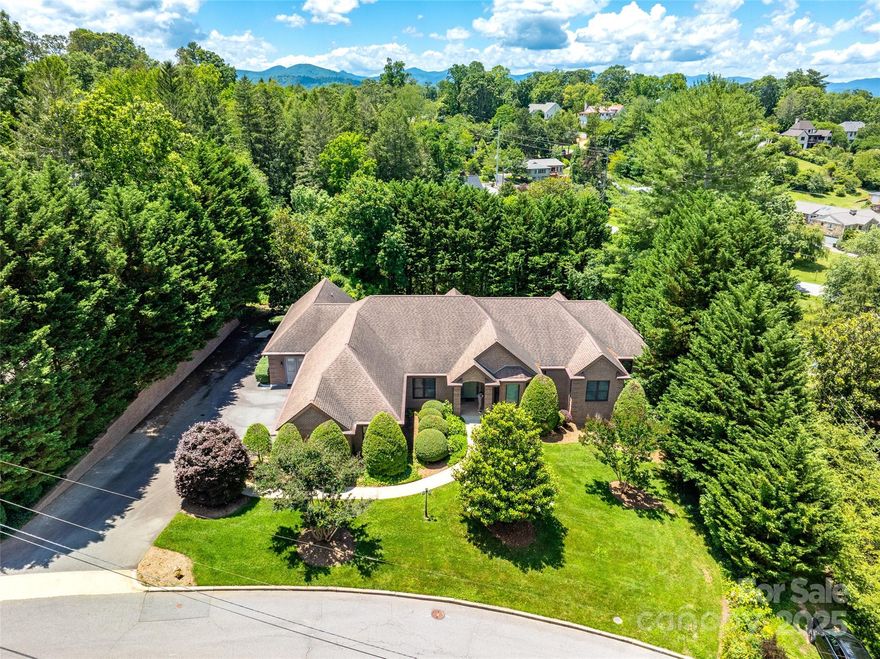 This beautiful one owner custom home is on 2.28 acres, only 2 houses from Beaver Lake! This 4-bedroom 3.5 bath home was built with extra attention to detail as can be seen in the beautiful hardwood floors, tile screened porch, open concept living in the kitchen and living room, central vacuum, radiant floor heating, 10-foot ceilings, whole house generator, ADA compliant living spaces and more. 

There is a 1500 sq ft section with its own separate entry. This space could be used as a mother in-law suite, or a long-term rental. The bedroom has an ensuite bath and walk-in closet. Another room could be used as a living room with space to add a kitchenette. The 3 bay garage has space for lawn equipment and a workshop. One of the garage doors is tall enough for a handicap van.

The unfinished daylight basement has 10' ceilings and houses the radiant floor system, and a door to the huge backyard.