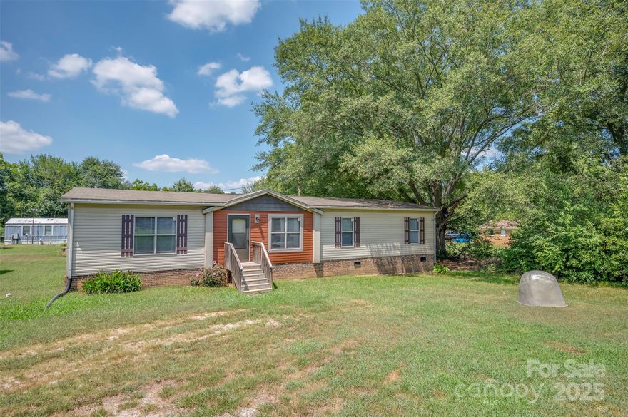 This 2017 manufactured home offers approximately 1,620 square feet of comfortable living space. Featuring 3 bedrooms and 2 full bathrooms, the home blends functionality with modern style. The spacious open-concept layout includes a large kitchen with a center island—perfect for entertaining. A walk-in pantry provides ample storage for all your culinary essentials.

The private primary suite boasts a standalone tub, a separate walk-in shower, and a generous walk-in closet. Additional highlights include central heating and air conditioning for year-round comfort.

And almost forgot to mention—seller is offering a $2,500 credit toward new flooring at the time of closing!