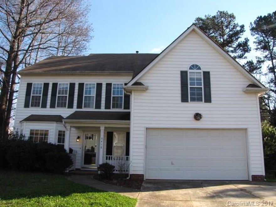 Tri-level w/easy access to I-85, I-77, shopping and dining! Features incl gas fireplace and 12' ceilings in great room, w/access to deck and patio in fenced backyard. Formal dining room accented w/bay window and moldings, kitchen w/wood flooring, nook and breakfast bar. Second level incl guest bedroom, laundry room and master suite w/vaulted ceiling, his-and-hers closets and deluxe bath. Two bedrooms and full bath round out third level. Home sits on a corner lot with mature trees.