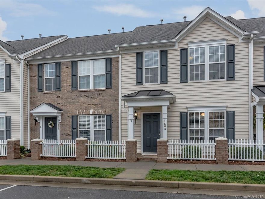 Wonderful home w/covered front entryway in desirable neighborhood w/amenities and easy access to I 77, shopping & restaurants. Home features upgraded flooring; only the stairs are carpeted; 42" rich cabinets in the kitchen; vaulted ceiling in the sun room; 2 spacious master bedrooms w/private en-suite bathrooms; one master has a tray ceiling, walk in closet, & new tub w/shower surround; ceiling fans in bedrooms & living room.  Patio & detached shed in the back w/view of mature wooded trees.