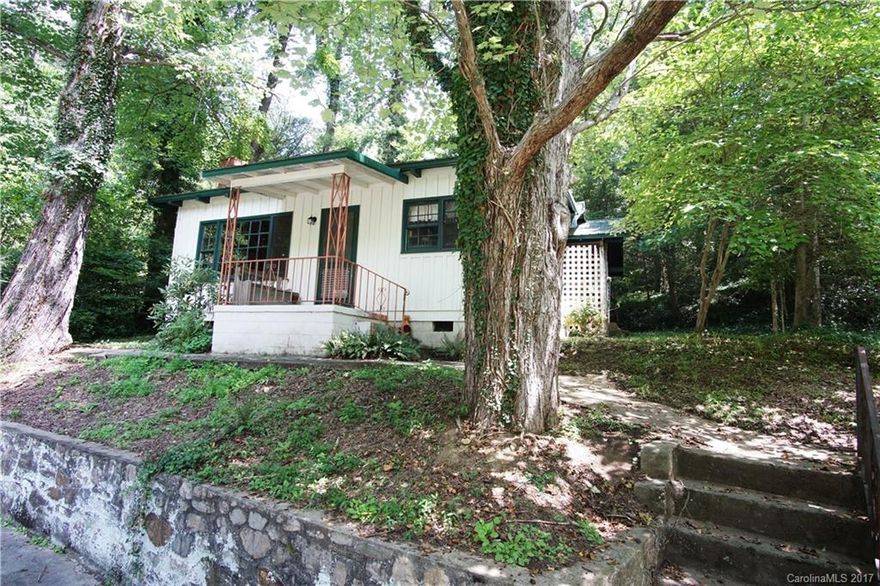 Authentic and original adorable 1945 Lake Junaluska Cottage located on Stuart Circle in walking distance to all that wonderful Lake Junaluska Assembly has to offer. The Summar cottage boasts wood floors. pine paneling, 3BR/1.5BA and two fireplaces. The livable cottage needs tender loving updating and is being sold as is/where is and priced accordingly. Seller states that the electrical and plumbing have been updated. The home is adjacent to the beautiful Cornellia Bryan Nature Center.