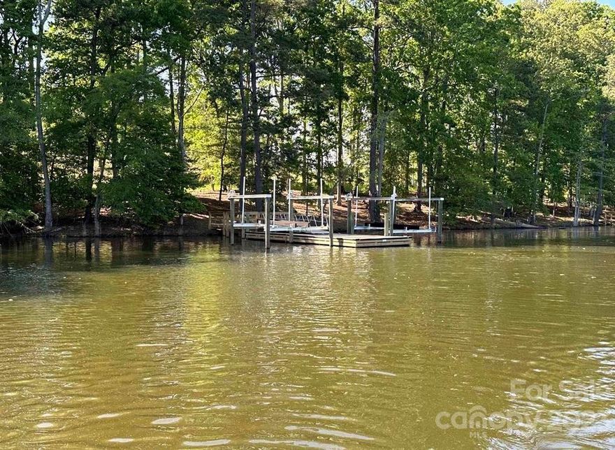Prime Waterfront lot on Lake Murray priced to move with dock located in Stewart Landing. Fiber Internet, Hiking Trails, Clubhouse and private marina. Stewart Landing is a new 205 acre, well thought-out waterfront community on Lake Murray. Lot has a gentle slope with an easy walk to deep water and dock. Water depth is approx 9-10 feet at normal water level. Dock is shared with lot 31 but boat lift is private. Just a short walk to all Amenities including: Restored 1842 historical clubhouse with amphitheater, state-of-the-art private smart gym, 110 Slip Marina and boat ramp, miles of hiking trails, boat storage, dog park, play ground, fishing piers, covered pavilions and much more. Stewart Landing is located between Columbia and Greenville, and in close proximity to Chapin and historic Newberry.