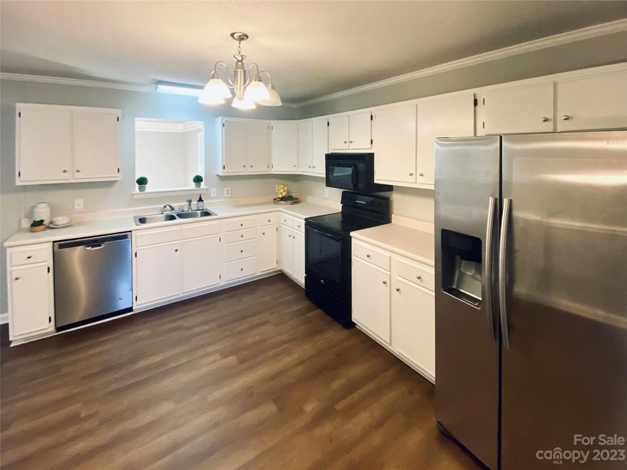 *UPDATED 12/2023! KITCHEN CABINETS refaced, painted & new hardware added!* Enjoy “front-porch sitting” at its finest on the graciously-sized, covered porch of this 3 bed, 2 bath ranch style home situated on a 1+acre lot w/ NO HOA! This home features a spacious living rm w/brick fireplace, while the kitchen boasts an abundance of cabinet & counter space, a breakfast area & walk-in pantry w/built-ins.Bonus/flex rm is perfect for a 2nd living area, home ofc, playrm, etc. All bedrms are spacious w/ the primary featuring its own bath. Storage space abounds, w/multiple closets & shelving. Neutral colors throughout create the perfect palette to make this home your own. All appliances remain to incl’d REF/W/D. Large yard out back w/ fenced area. Recent ext updates per seller incl’d: vinyl trimwork, lighting upgrades to security lights on 3 sides & multiple elec outlets. Come see all the charm a small town has to offer while enjoying the convenience of Charlotte & Gaston County.