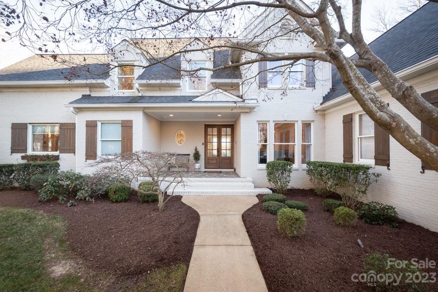 SPECTACULAR peninsula lot home w/ incredible main channel sunrise & sunset views of LKN w/ approx. 285 ft of unobstructed shoreline is located on a quiet cul-de-sac. Home beautifully remodeled to modern day standards by prev. sellers & more recently bathrm. upgrades, 32 rear facing energy saving Solar Panels &  EV charging station in the 3 car garage were added. Gorgeous gourmet kitchen w/ oversized Quartz Island, top of the line appliances & views for miles! Adjacent great rm. w/ built-ins, gas firepl. and wall of glass sliding doors to take in the stunning views. Main level luxurious owners retreat has attached sunroom with panoramic vistas. Hardwoods throughout, central vac, new mahogany double front entry door & lake fed irrig. are only a few of the many options to be enjoyed. Deeded boat slip #4, maintained by comm. dock dues, is truly outside your door for easy access. Pictures could never do this home justice; it is a must see to experience the lifestyle it provides!