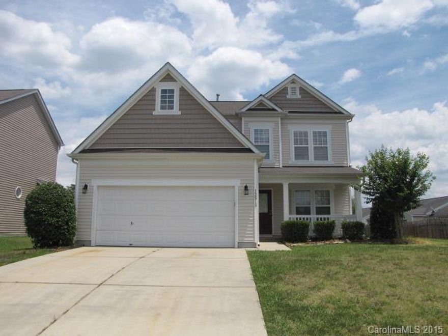 You'll love this light and inviting 4-BR, 2.5-BA home in neutral decor. Features include a marble surround fireplace in the living room, and crown and chair rail moldings in the dining room. The kitchen has oak cabinetry, SS appliances, and a bar and breakfast area with access to the backyard patio. Master suite features include a vaulted ceiling, walk-in closet and a private bath with dual sinks, a garden tub and separate shower.  The walk-in attic and 2-car garage offer extra storage.