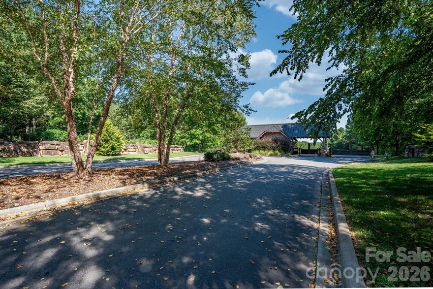 Interior lot in gated community, Lake Rhodhiss Estates. Community is centrally located in the foothills of the Blue Ridge Mountains. Paved road frontage with city water and sewer available.Community offers amenities including pavilion with views, grill, picnic area, fire pit and recreational area including dock.