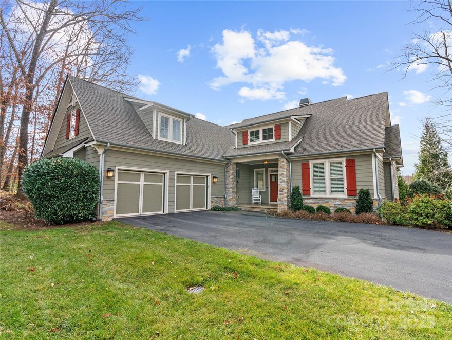 Located in the prestigious gated community of Cedar Rock at Biltmore Lake, this stunning home, freshly updated, offers over 4,300 square feet of beautifully designed space with five bedrooms and five full baths. Enjoy effortless single-level living with an open floor plan, vaulted ceilings and an abundance of natural light. The main level features a luxurious primary suite, along with a guest bedroom and bath, providing convenience and comfort. The remodeled kitchen is an entertainer's dream, seamlessly flowing into the living and dining areas. Utilize the finished room over the garage for additional guests or living space. The finished basement expands the living area with a spacious family room, a gym, and two additional guest suites. Take in breathtaking year-round mountain and lake views while enjoying over seven miles of scenic walking trails. Community amenities include a lake, boathouse, playground, clubhouse, tennis and basketball courts, and social events.