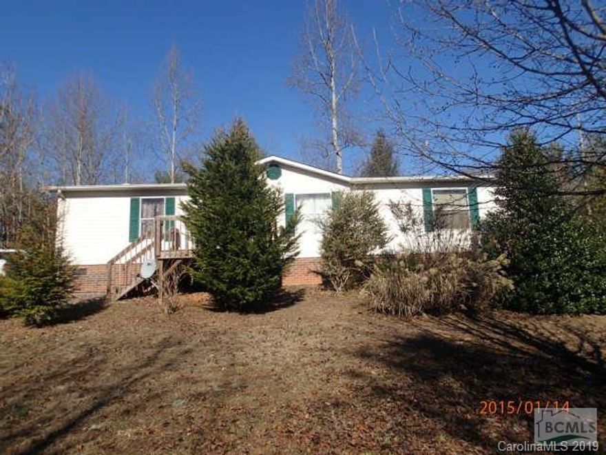 Spacious 3 bedroom 2 bath home in Lenoir NC. Location is very private and surrounded by woods. The singe level home features a large living area w wood burning fireplace and vaulted ceilings.Galley style kitchen has plenty of cabinet space and opens to a formal dining area. Laundry room just off kitchen at rear entrance. Master suite w private full bathroom on one end of home and 2 addt bedrooms w a 2nd full bathroom on other end.A front deck and screened rear porch give you plenty of space to enjoy the outdoors. Home sold AS-IS/WHERE-IS with ALL FAULTS.Seller or sellers agents make no warranties or representations.Buyer or buyers agent to verify all stats.Seller will consider FHA 203K rehab loan or cash ONLY!