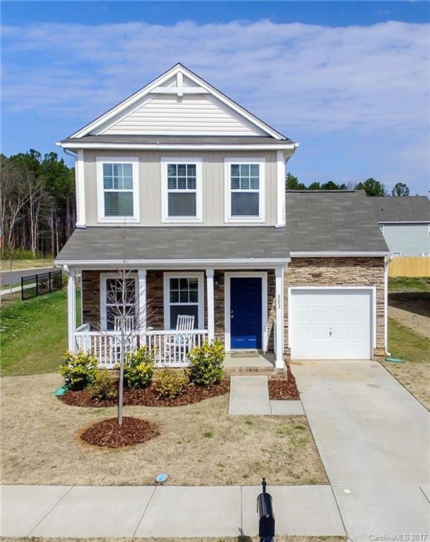 Gorgeous 3BR/2.5BA home in Rock Hill neighborhood of Roddey Park! Clean neutral luxury finishes: granite, white cabinets, hardwoods, stainless steel appliances, eat in bar/island, tile backsplash, upgraded lighting. Open floorplan concept, perfect for entertaining. Fenced yard for privacy and covered rocking chair front porch as well inviting you home.  This home is immaculate, well maintained, and move in ready!