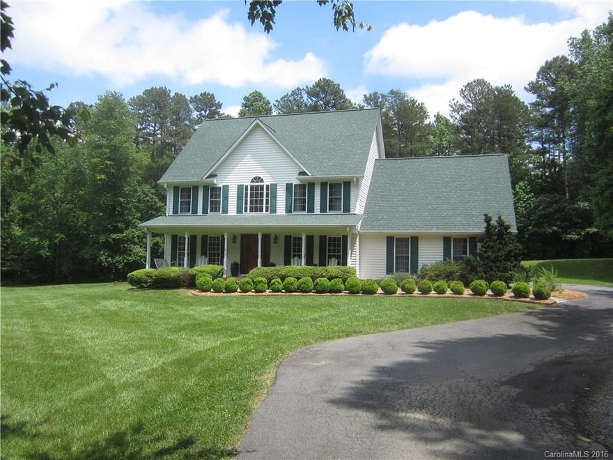 Tucked away on 4.54 acres with lots of Privacy,Beautiful home with 2464 sf,3 Bedrooms and 2.5 baths and a Bonus room,  foyer, dining room, living room, sitting room and kitchen with hardwood floors, master bedroom with private bath, tub with separate shower, deck and 2 car garage