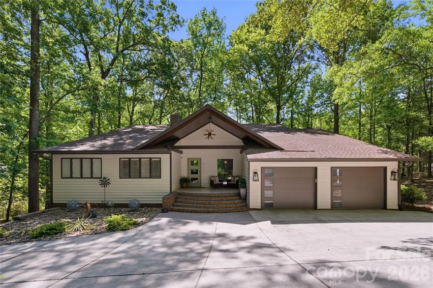 BACK ON MARKET AT NO FAULT OF THE SELLERS. Tucked away on a private, wooded 1.26-acre lot, this beautifully renovated retreat offers the perfect blend of comfort, character, and everyday livability in one of Weddington’s most desirable locations. With over 4,000 square feet, 4 bedrooms, and a fully finished basement, this home invites you to slow down, unwind, and truly enjoy where you live. From the moment you arrive—passing a charming horse farm just down the street—you’ll feel the peaceful, estate-style setting that defines this area. Inside, tons of natural light pour through beautiful, oversized windows, highlighting the home’s inviting spaces and thoughtful updates, including an updated kitchen designed for both function and style. The layout features a primary bedroom on the main level, offering convenience and a private place to recharge, with its own porch access for quiet mornings or evening wind-downs. Designed with lifestyle in mind, this home truly shines when it comes to indoor-outdoor living. Enjoy multiple outdoor spaces, from the welcoming front porch to a private porch off the primary suite, along with covered areas, expansive patios, and a fire pit—perfect for gathering with friends, hosting, or simply enjoying the peaceful surroundings year-round. The fully finished basement expands your living space with a dedicated office and a spacious recreation room, ideal for movie nights, game nights, entertaining, or relaxing. Whether you’re hosting guests or enjoying a cozy night in, this home offers flexibility for every stage of life. Surrounded by mature trees and natural privacy, the setting feels like your own personal escape—yet you’re just minutes from shopping, dining, and everyday conveniences. Located in the highly sought-after Weddington school district, this home combines tranquility with top-tier location. This is more than a home—it’s a lifestyle.