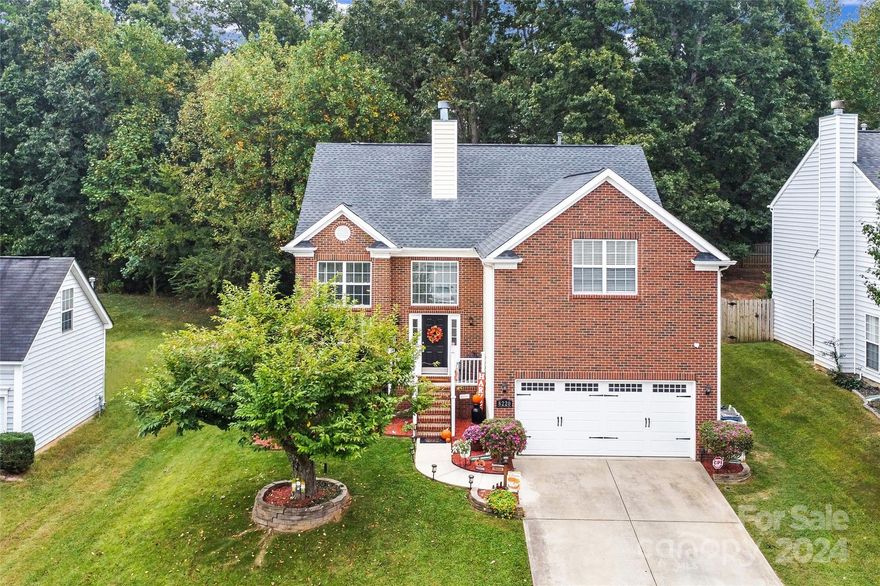 You'll love this gem nestled in highly desired Popular Woods. Situated on a large lot and backing up to woods, this home is perfect for enjoying peaceful living. As you approach, you'll be immediately taken by the picturesque curb appeal with meticulously curated landscaping setting the stage for what lies within. Stepping inside, you’re warmly welcomed by BRAND NEW LVP Luxury floors & a cathedral ceiling. This home's floor plan has been thoughtfully designed to be both open & versatile, effortlessly blending indoor elegance with outdoor tranquility. For those who cherish alfresco relaxation, the screened-in porch provides a cozy haven, while the back deck is perfect for soaking in the peaceful surroundings. The fenced-in yard is perfect for both pets and play. On the main level, the spacious primary bedroom beckons a spacious WIC and primary ensuite bathroom. You'll also find the laundry on the main level. Upstairs features three spacious bedrooms and a loft. Schedule your tour today!