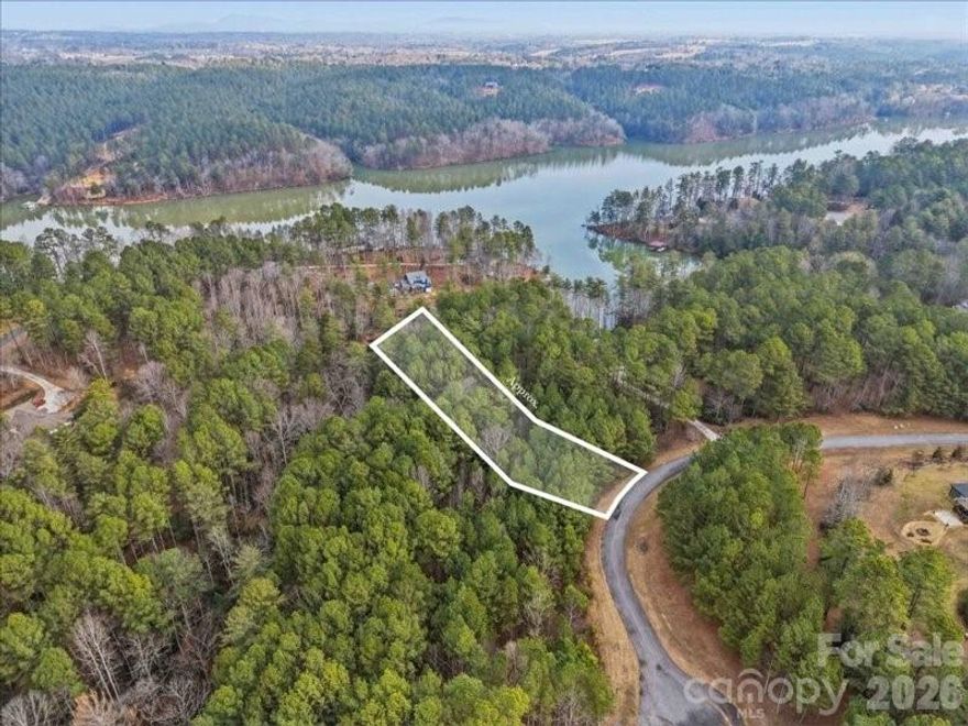 Nestled within the prestigious gated community of Harbor Ridge, this exceptional 1.28-acre 
lakefront lot offers a rare blend of natural beauty, privacy, and effortless access to lake 
living. The property’s gentle, tiered slope provides an ideal setting for a custom home, 
perfectly suited for a walk-out basement or thoughtfully designed multi-level outdoor 
spaces that capture serene water views. 
Surrounded by mature trees, the lot creates a peaceful, secluded retreat while still enjoying 
the benefits of a welcoming community with exclusive amenities. Residents have access to 
private lake entry, community boat slips, and dedicated boat and RV storage — perfect for 
those who embrace an active, outdoor lifestyle. 
Whether you envision building a full-time residence or a relaxing weekend escape, 108 
Rivercliff Drive West offers the space, setting, and lifestyle you’ve been dreaming of. 
Discover the very best of lakefront living in Harbor Ridge.