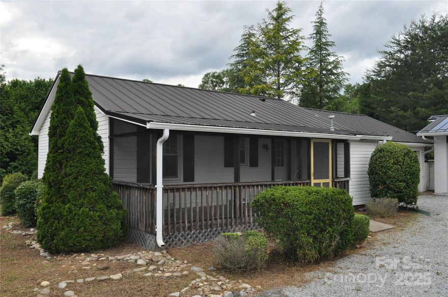 This cozy bungalow will make a great first time home and offers plenty of extra space for multiple vehicles.  The dwelling features hardwood floors and plantation shutters throughout the main living area, and a completely remodeled eat-in kitchen with luxury vinal flooring.  There is a laundry room, which is finished, unheated square footage that has a washer hookup, but a new gas dryer connection will need to be added.  The hot water heater is natural gas and was replaced in 2023.  There is a gas line run to the living room for a gas log unit. Along with an attached garage is an additional bank style carport offering more space for a variety of uses.  The oversized lot is a total of around a half acre as half of the neighboring lot was added to the property in 1994.  Very convenient location to downtown, schools, grocery shopping and the interstate.