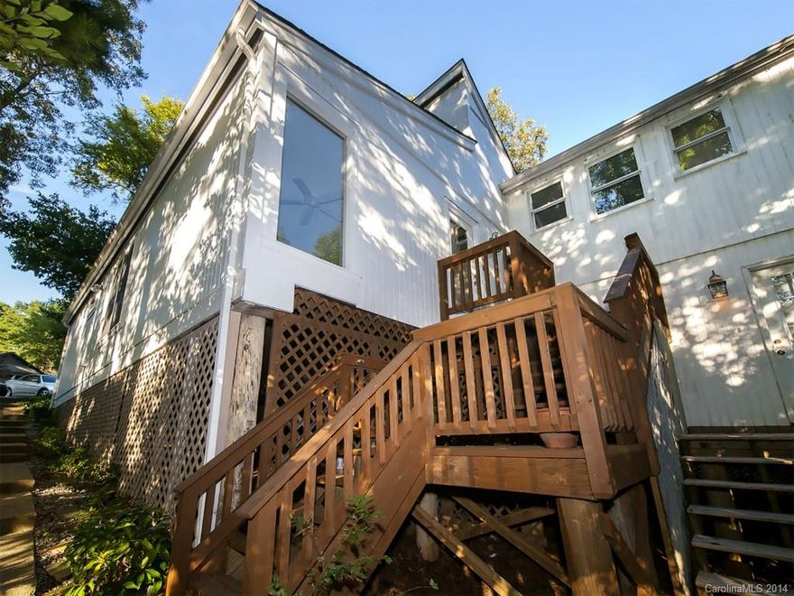 Elevated townhouse 2 bedroom, 2 baths in a cul-de-sac, across the street Tega Cay Country Club, Golf and Tennis.
Open floor plan, hardwood floors, ceiling fans thru out, new Pella triple/double slider to porch overlooking private back yard.
Ikea kitchen, hardwood floors, crown molding, open shelving. Bedrooms, new Pella over sized windows, crown molding, custom bamboo shades, walk in closets.
New roof, gutters, gutter guards, hot water heater, electrical, plumbing.