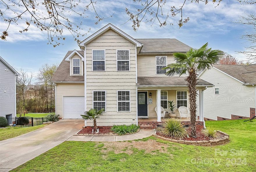 MOTIVATED SELLER!!! ALL REASONABLE OFFERS WILL BE CONSIDERED!! Welcome home. This lovely 4 bed, 2.5 bath home offers prime location near 1-77, convenient shopping, dining, and medical facilities. Enjoy upgraded lighting, granite countertops, and a charming tile backsplash in the kitchen, complete with a large butcher block island. Engineered hardwood flooring adds elegance, while an electric fireplace sets the mood. Retreat to the spacious primary en suite featuring a soaking tub, separate shower, and walk-in closet. Updates include a 2020 HVAC system and a fully remodeled hall bathroom. Step outside to a large, fenced backyard, perfect for outdoor gatherings and backing up to natural beauty.